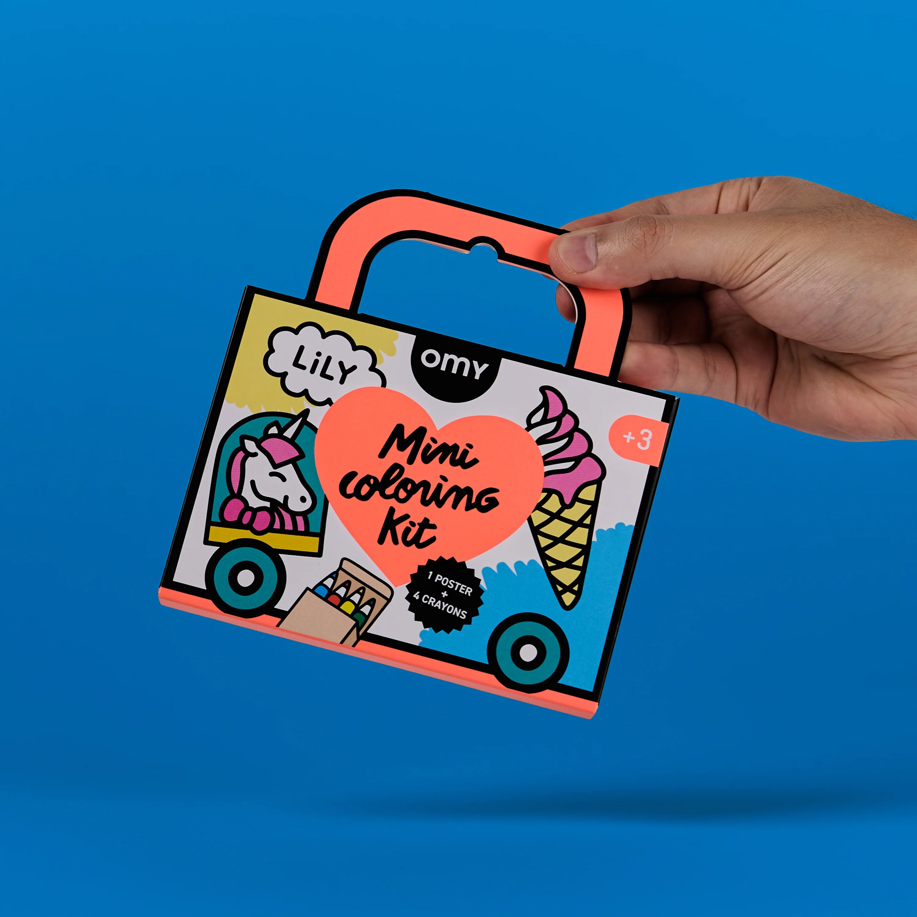 OMY Lily Coloriage Pocket — child colouring in the car on a trip
