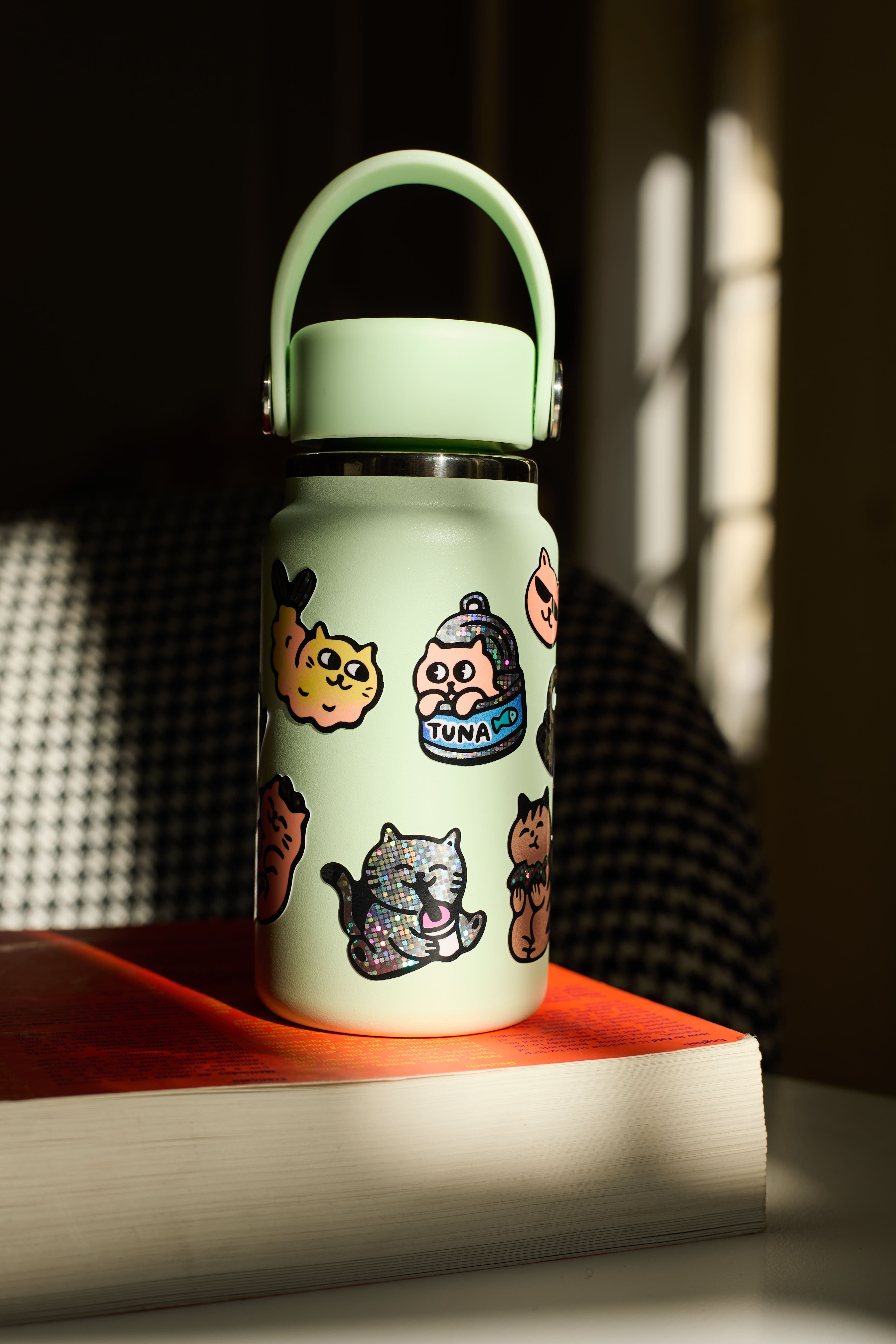 OMY Big Kitty - lifestyle scene with stickers on personal items