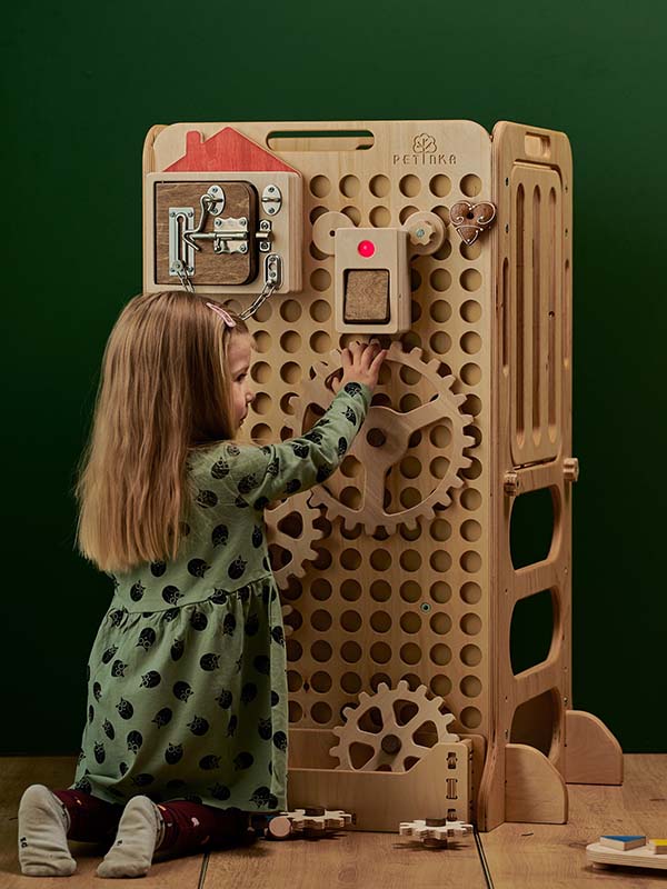 wooden learning tower for kids with montessori games